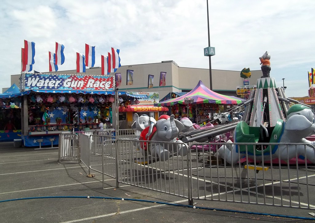Water Gun Race Carnival Game And Flying Eephants Ride. Flickr