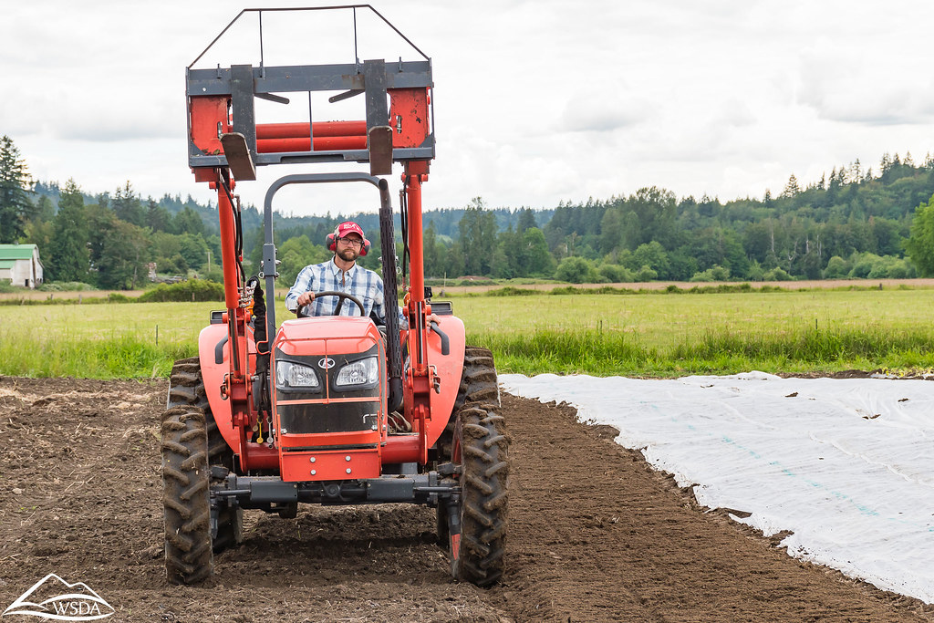 Farmer on tractor Washington State Department of Agriculture Flickr