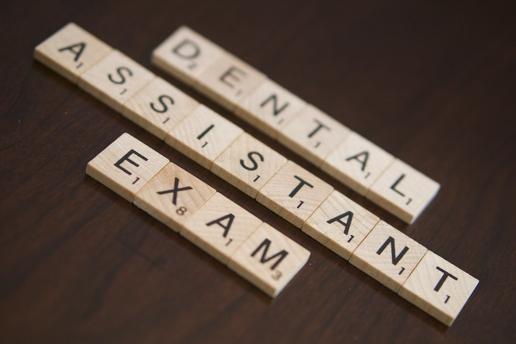 Dental Assistant Exam Dental Assistant Exam Stock Photo Wh… Flickr