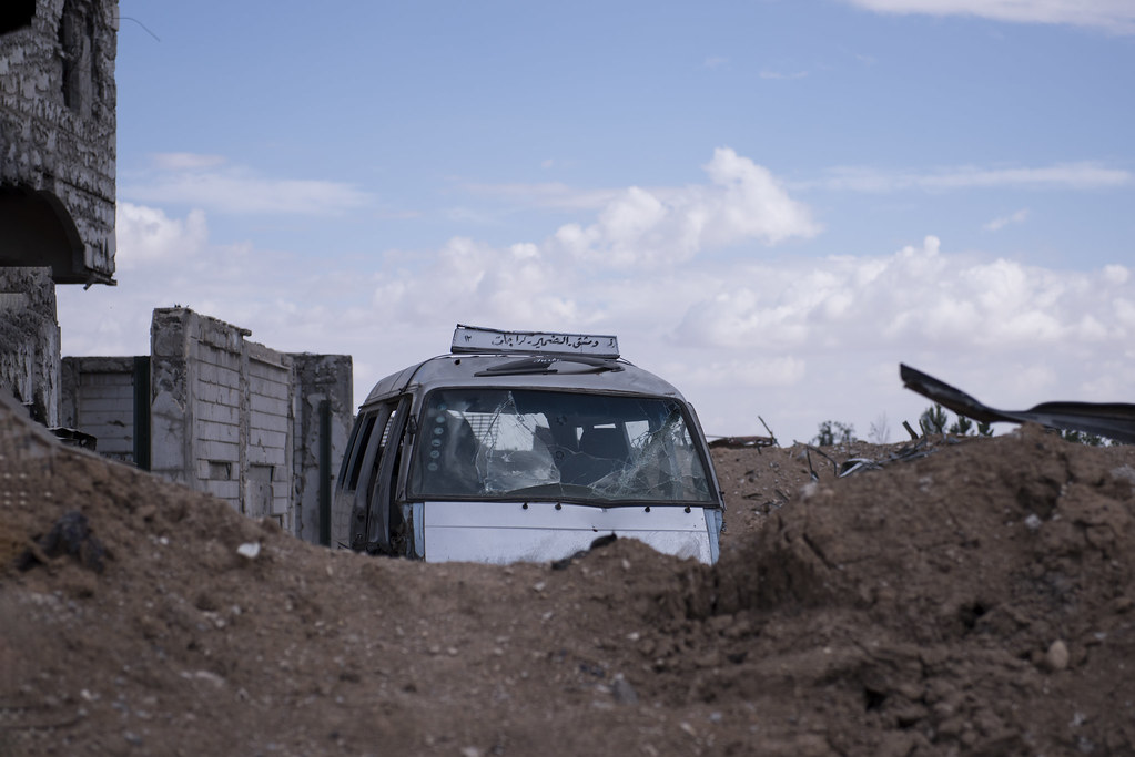 1 A damaged "DamascusDumairGarage" bus in Sa'ba Hasan Blal Flickr