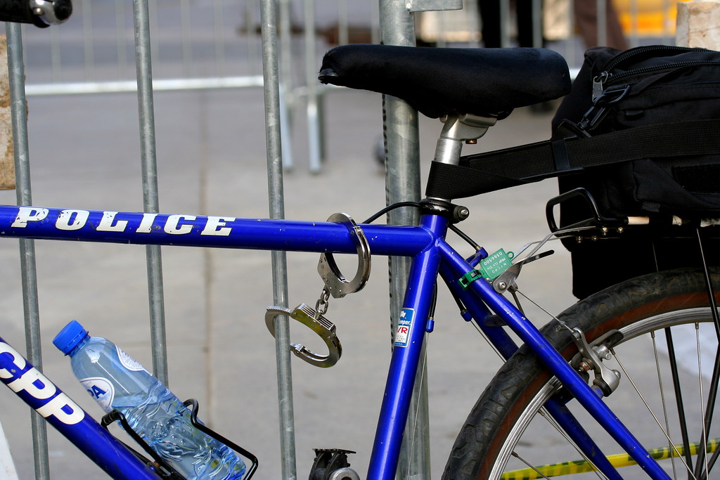 Police bike with handcuffs Iconic police bikelock hack. A… Flickr