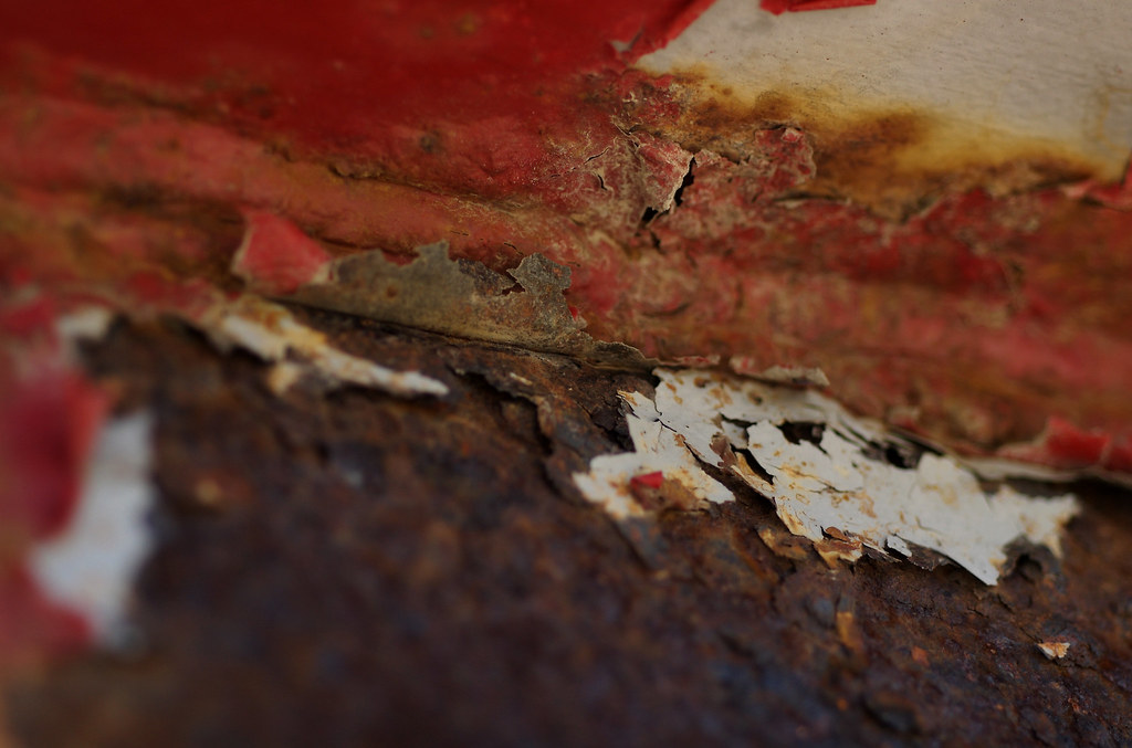 Rust Bin Rust and paint chips in the corner of an old tool… Flickr