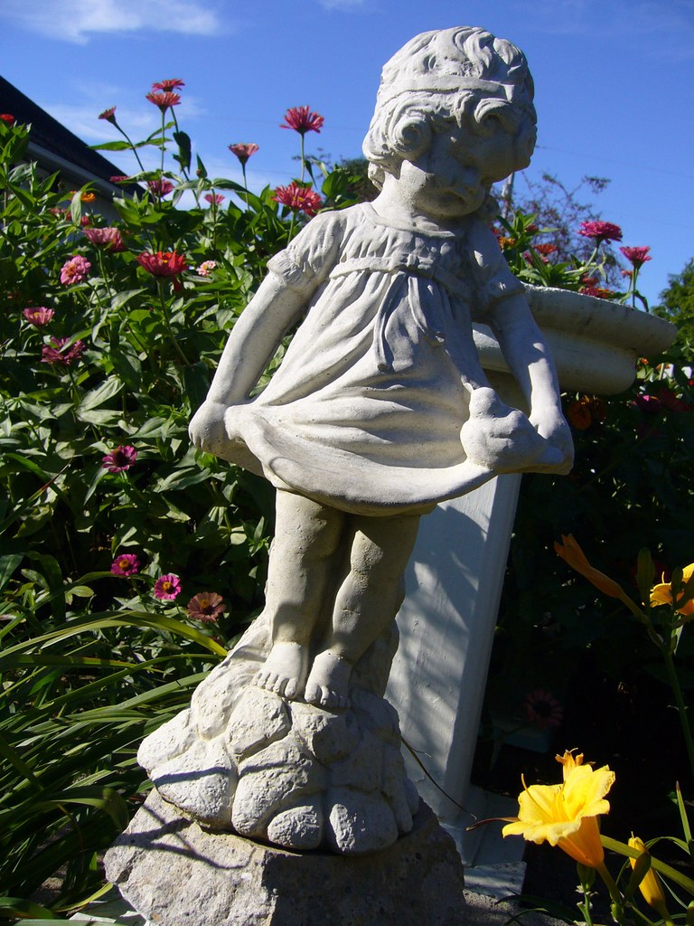 Statue in the pool garden Clayton Parker Flickr