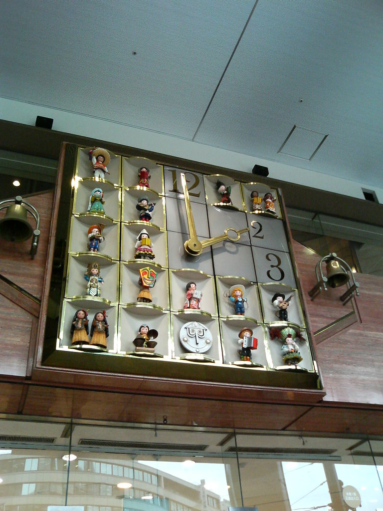 It's A Small World clock Crazy clock outside of Sogo Depar… Flickr