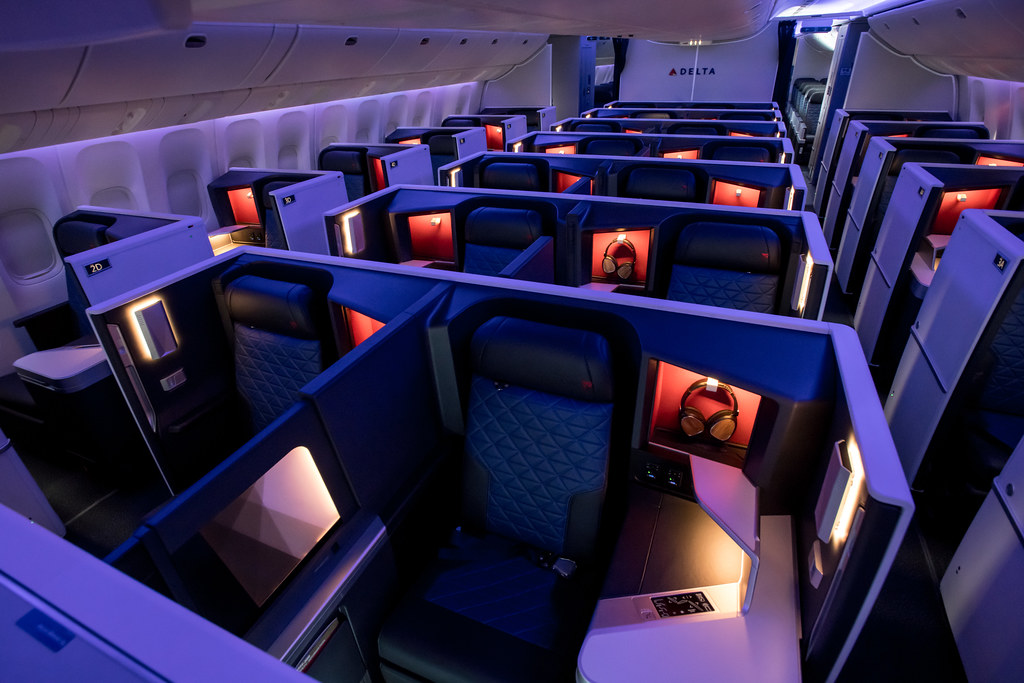 Delta One Suites Delta’s refreshed 777 aircraft include 28… Flickr