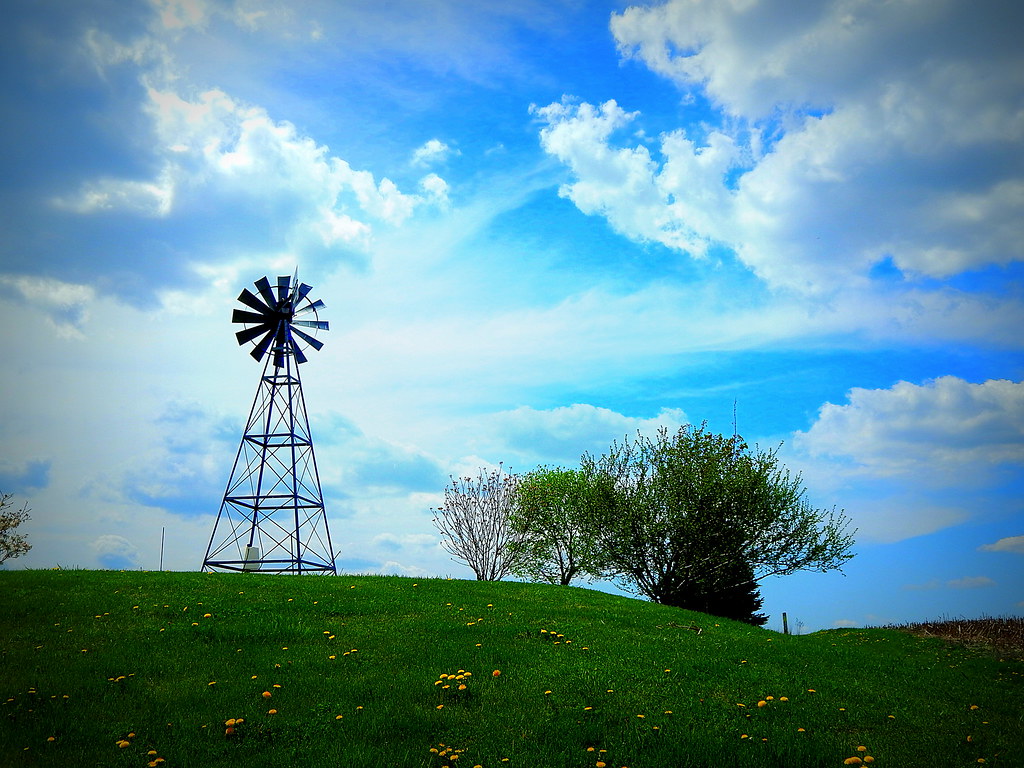A windmill and partly cloudy skies just west of Avilla Ind… Flickr