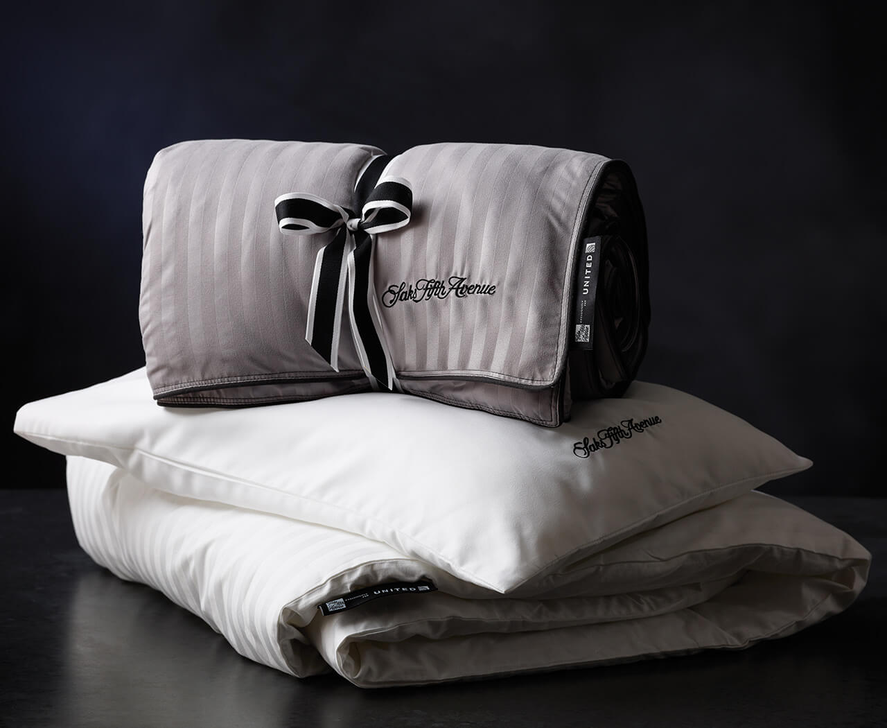 United Trims Saks Fifth Avenue Bedding Onboard Live and Let's Fly