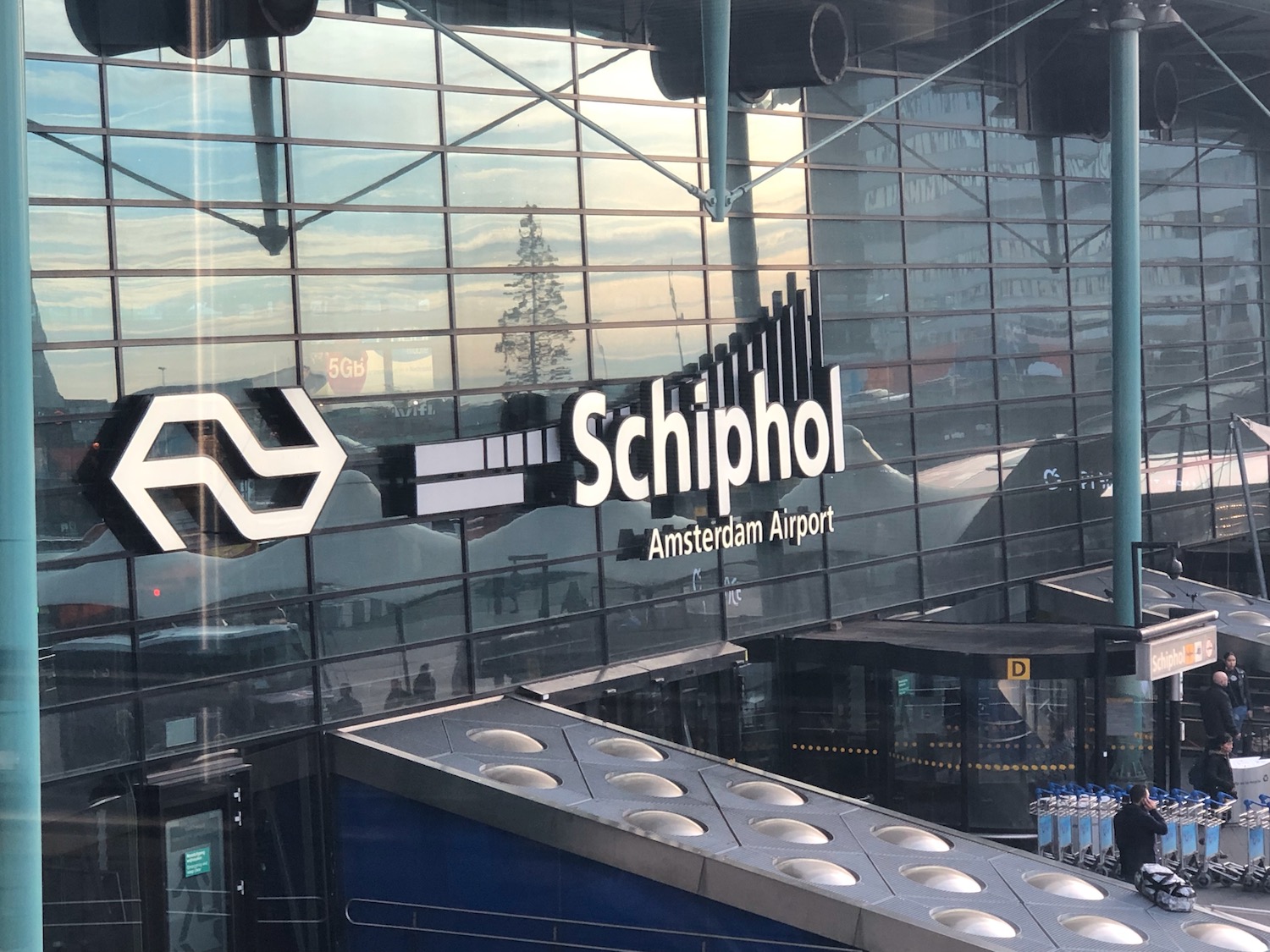 US Official At Amsterdam Schiphol Airport Harasses My Wife Over Green