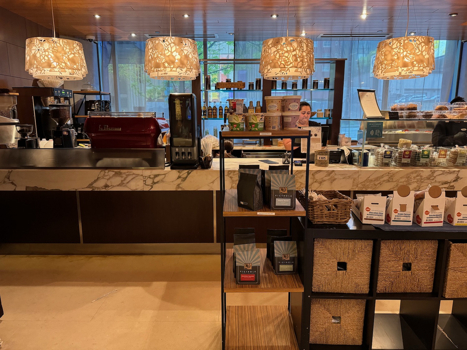 a counter with lights from the ceiling