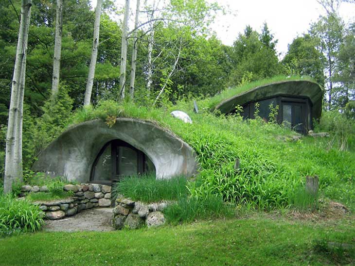 Homes Above and Below Airplane Hangar and Underground Homes