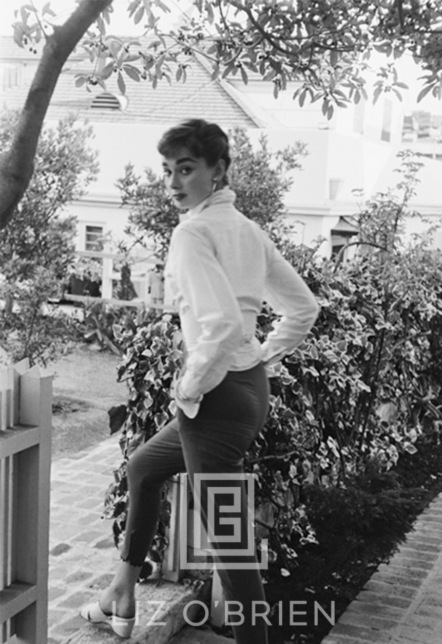 Audrey Hepburn strolls in front of her Beverly Hills apartment, Closer View, 1953 by Mark Shaw