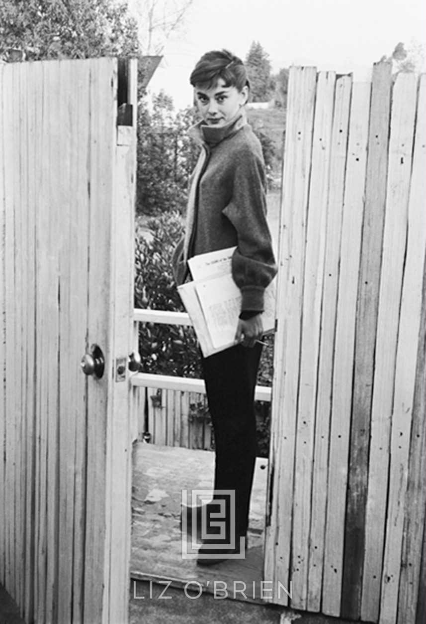 Audrey Hepburn at Apartment Gate, 1953 by Mark Shaw Liz O'Brien