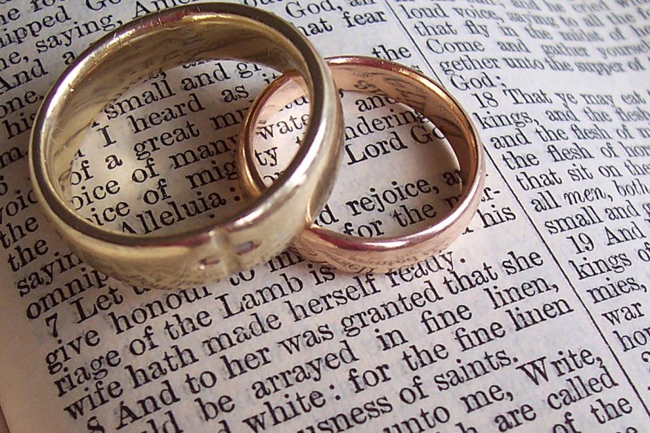 Returning to God’s Design for Marriage Locking Arms Men