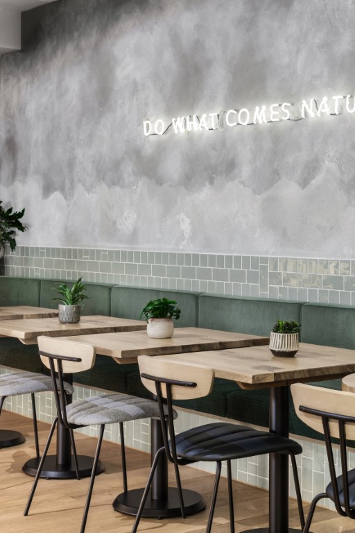 restaurant with concrete walls and wood elements from London