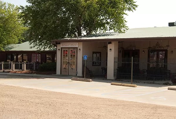 Our History Log Cabin Grill & Market