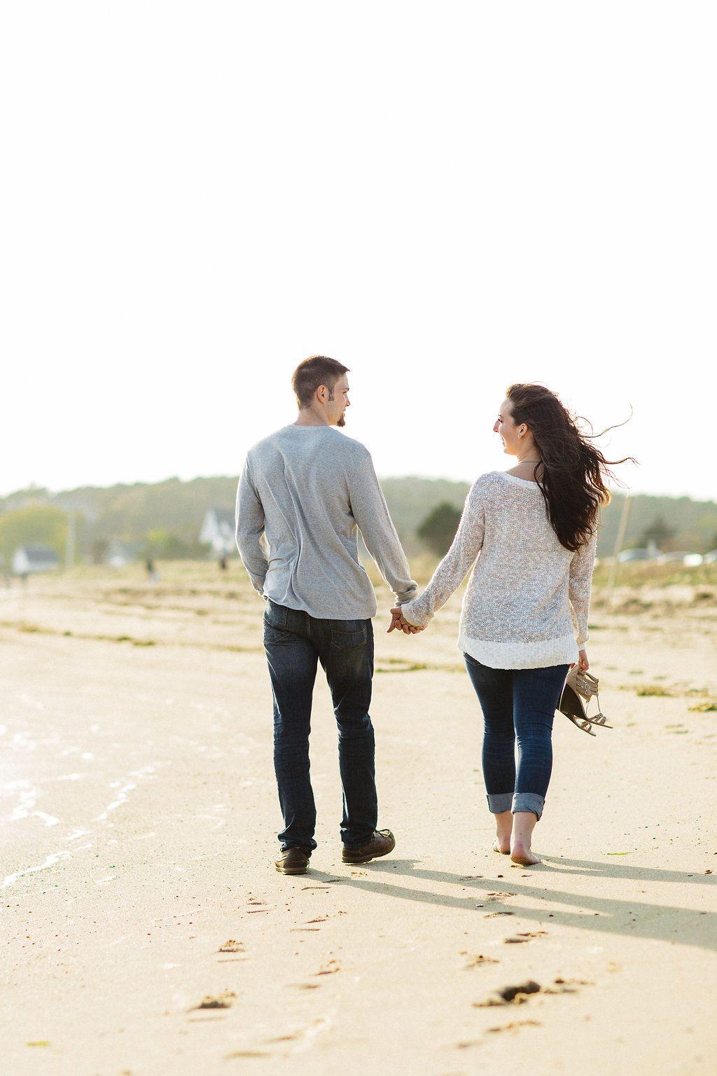 Yellow Person Holding Sun Logo