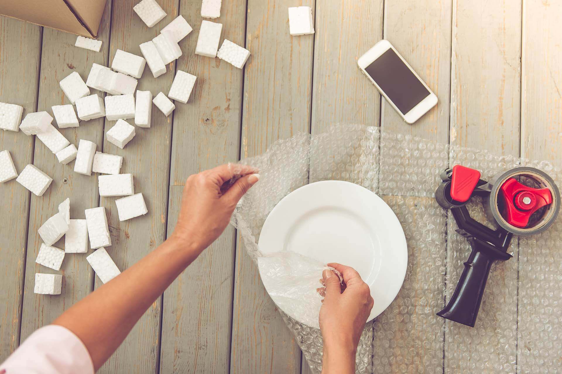 How to Pack Plates for Moving Fast and Easy Long Distance Moving Experts