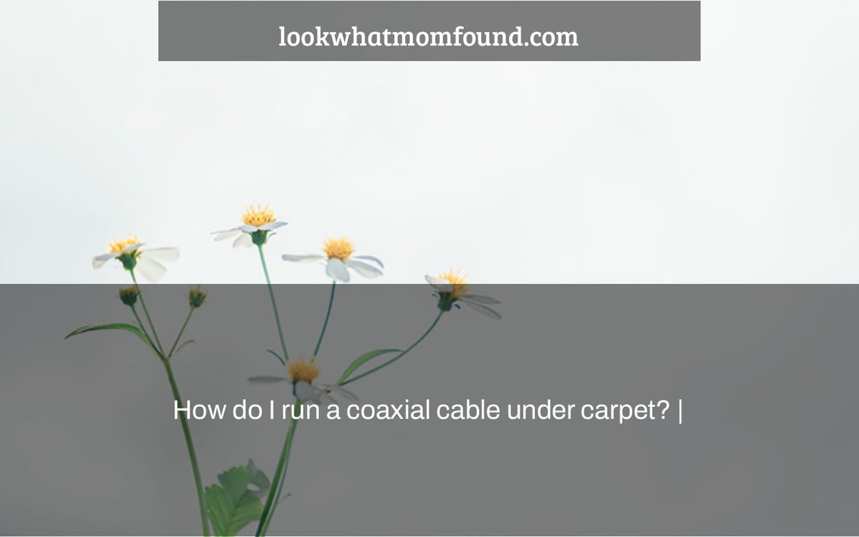 How do I run a coaxial cable under carpet?