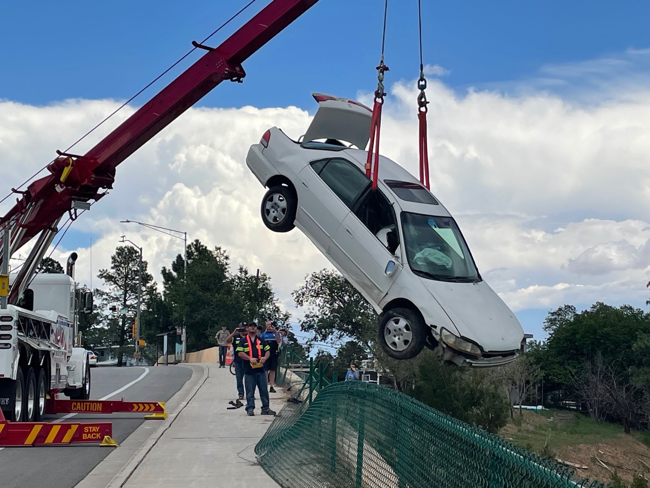 Car From Saturday Morning Crash On Diamond Raised To Roadway By Towing