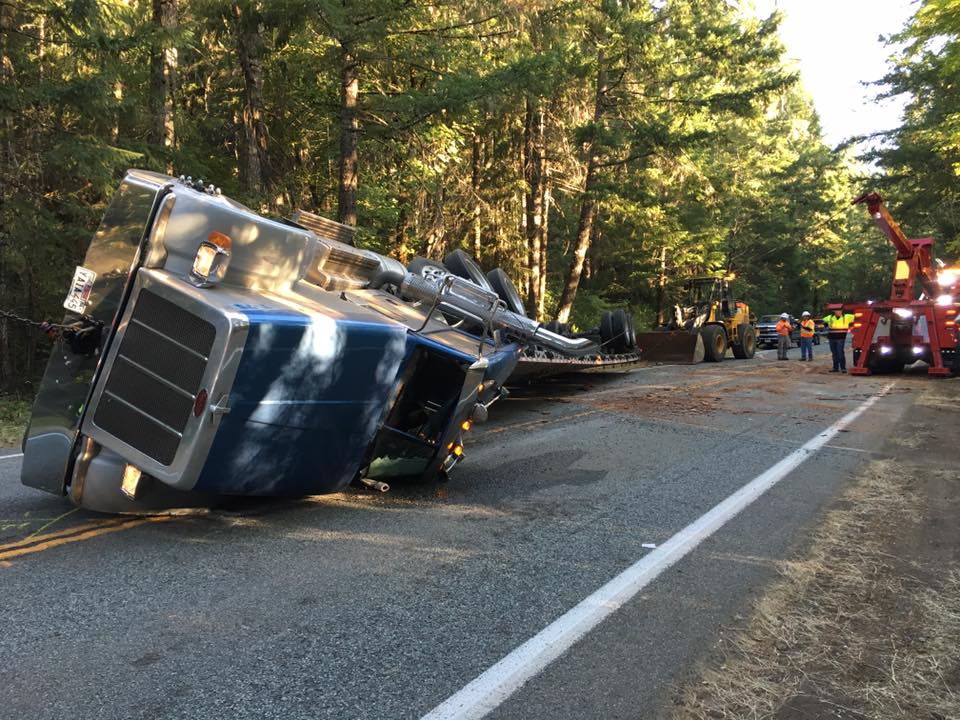 Overturned Big Rig Spills Logs All Over Highway 199, Halts Traffic at