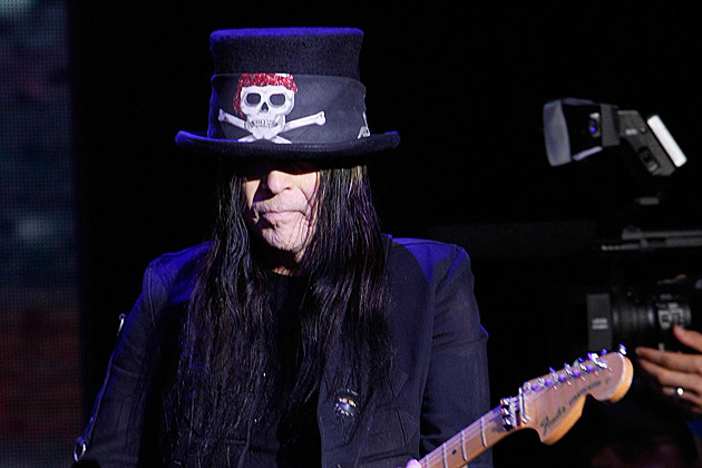 Motley Crue Guitarist Mick Mars Knocked Over by Audience Member at