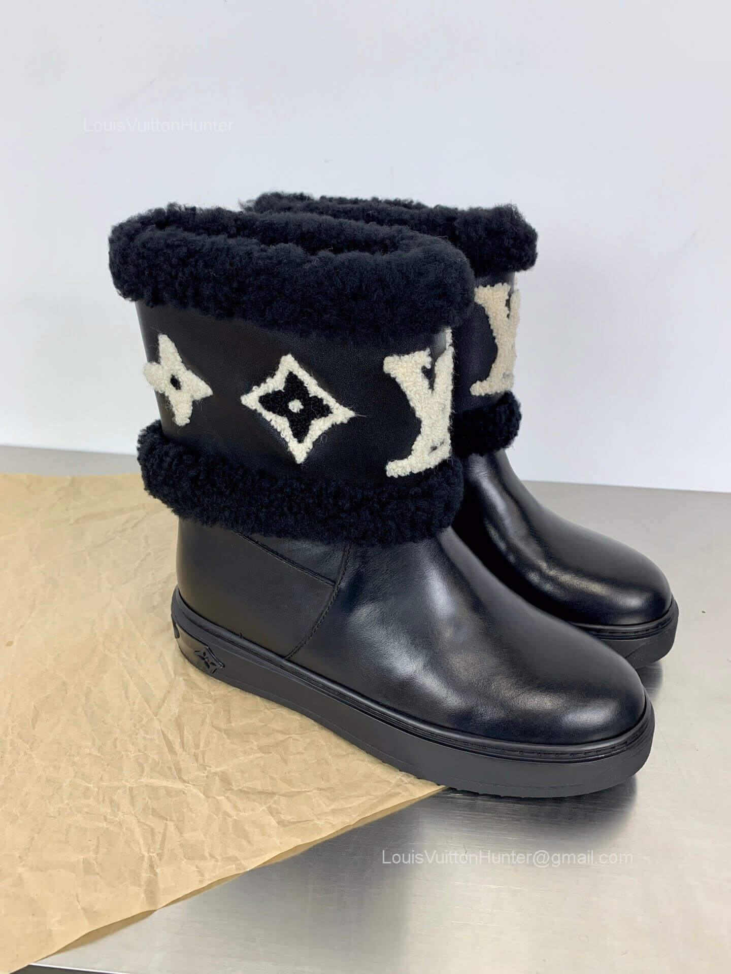 Louis Vuitton Snowdrop Flat Ankle Boot in Black Calf Leather and