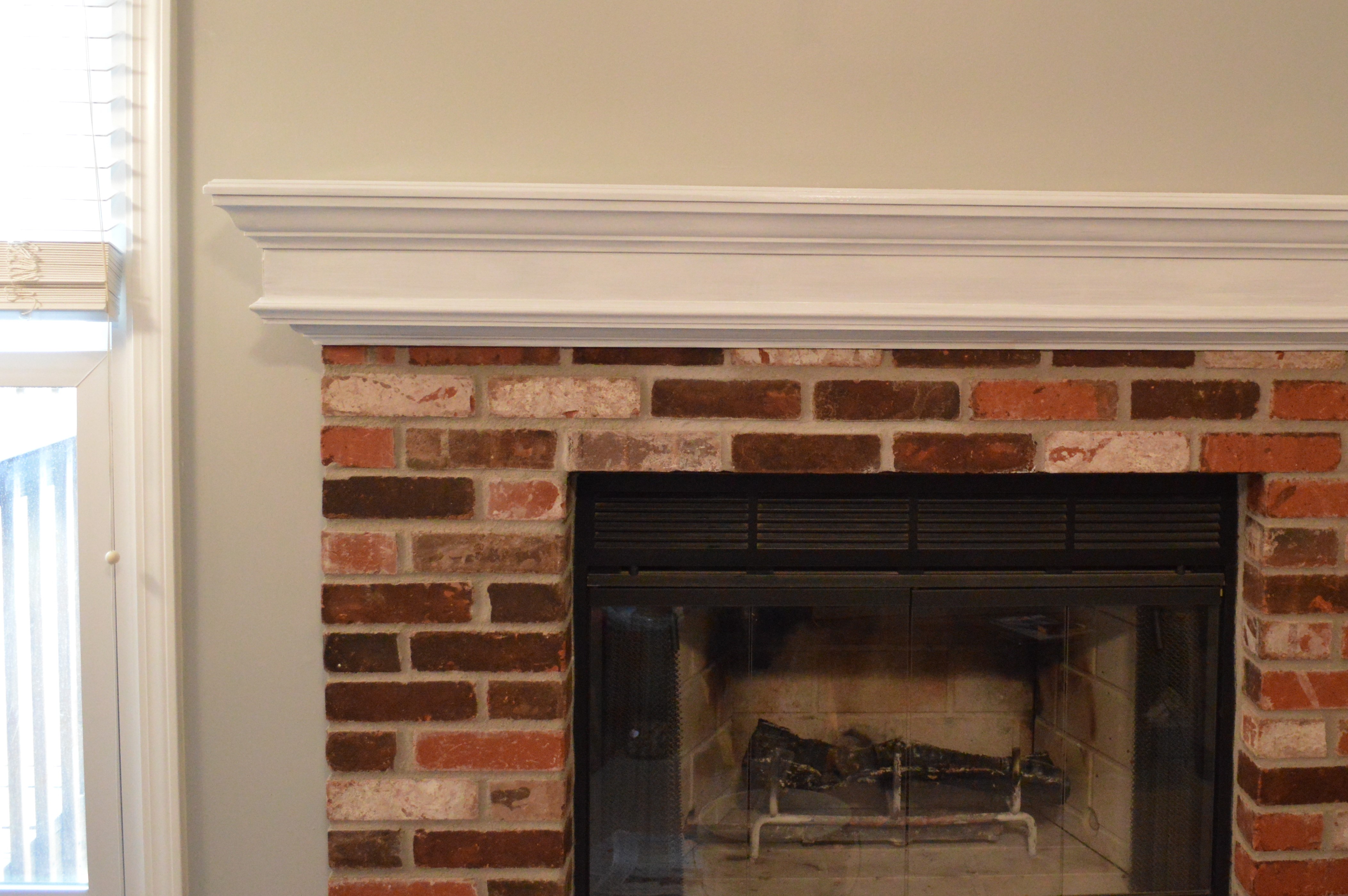 How to Whitewash Brick Our Fireplace Makeover Loving Here