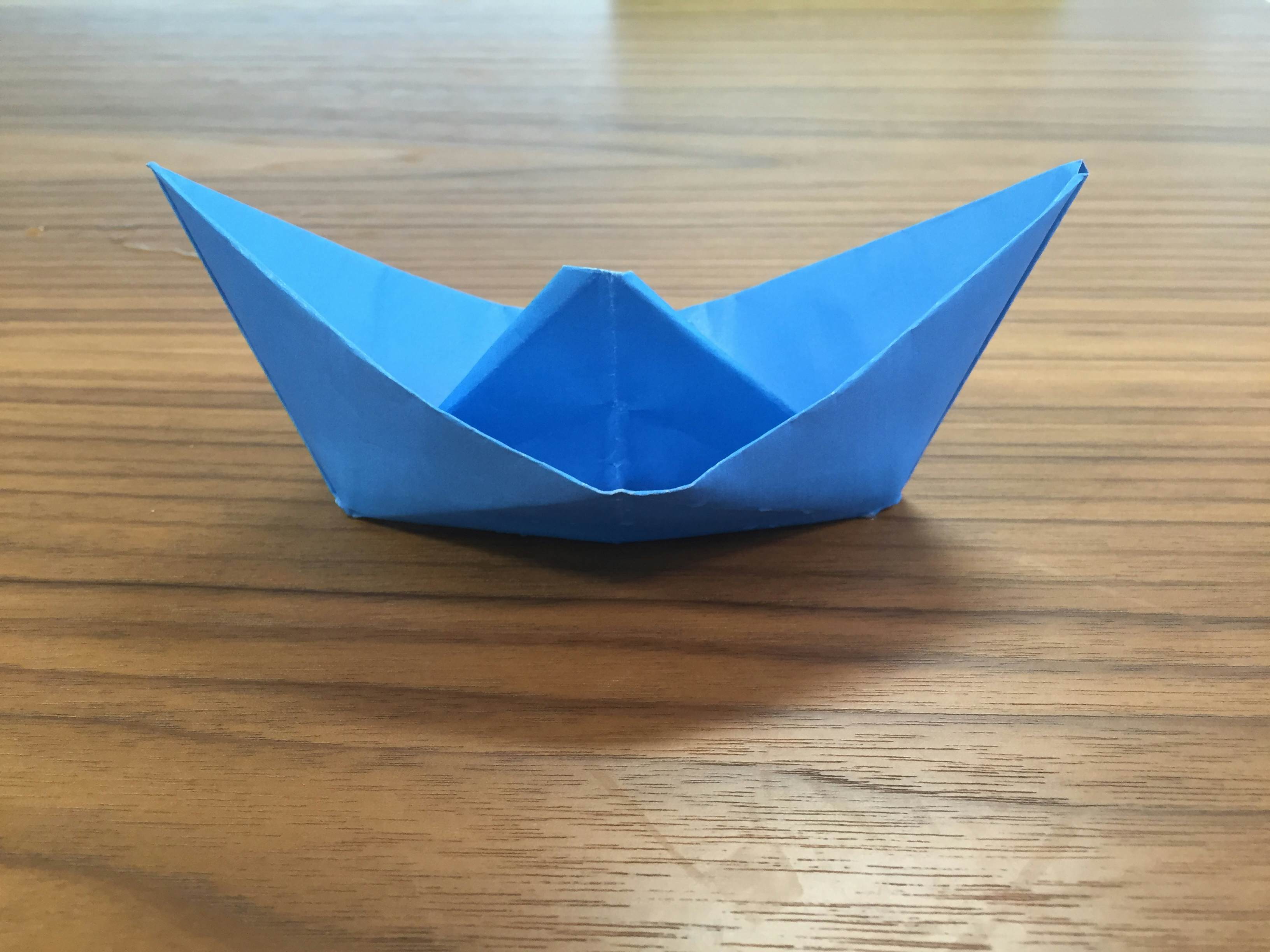 Rainy day activity Venice Regatta origami paper boat Lonely