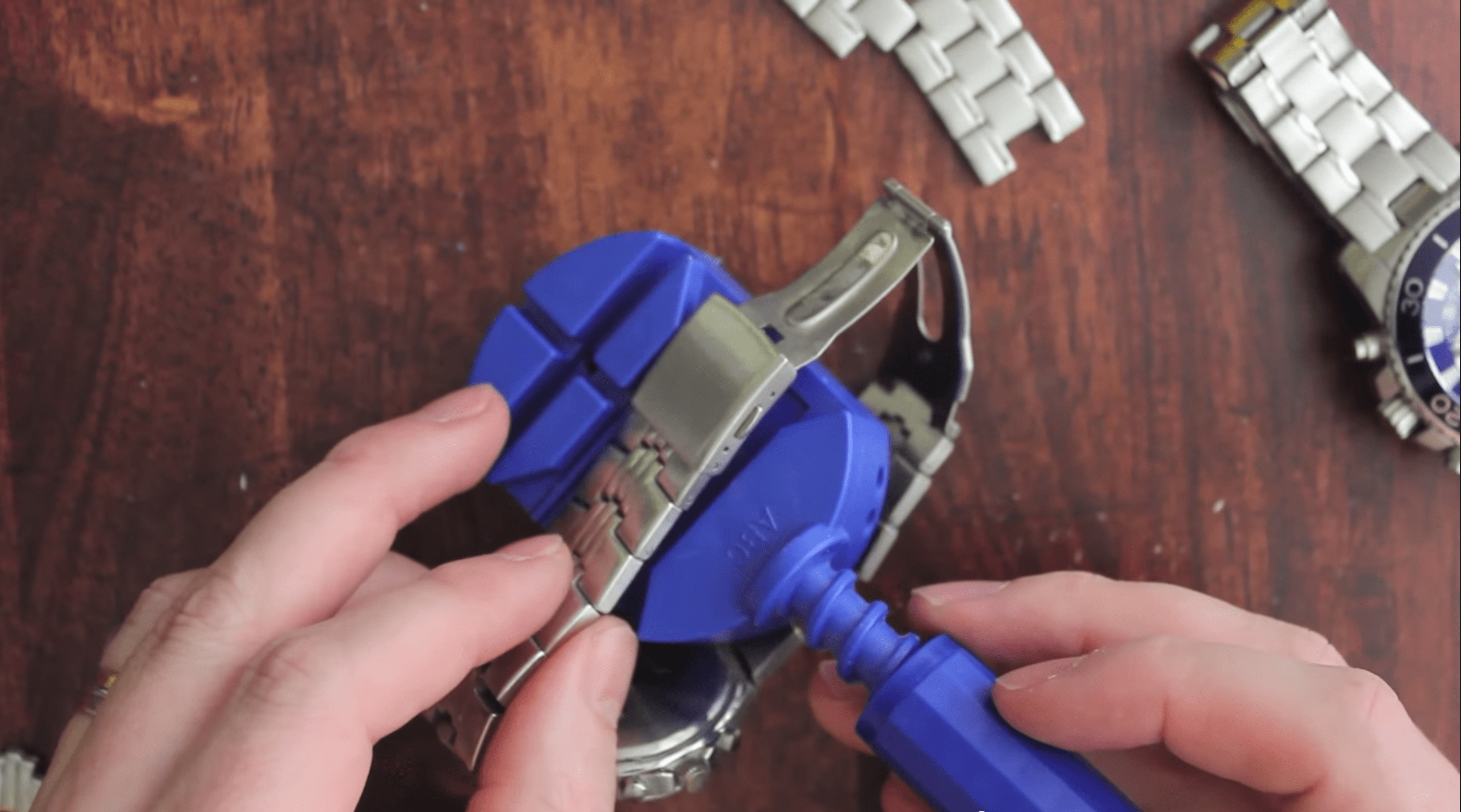 how to resize a watch with a link removal tool line up the pin LRN2DIY