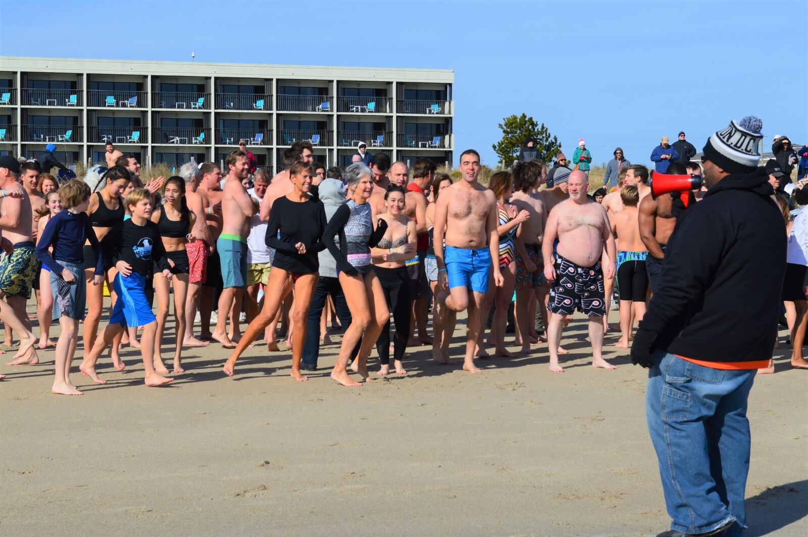 Wrightsville Beach swimmers brave freezing temperatures for coldest