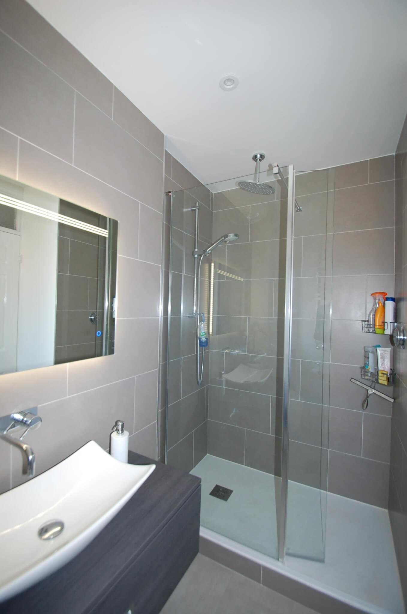 Roman walk in shower with flipper panel MBK Design Studio