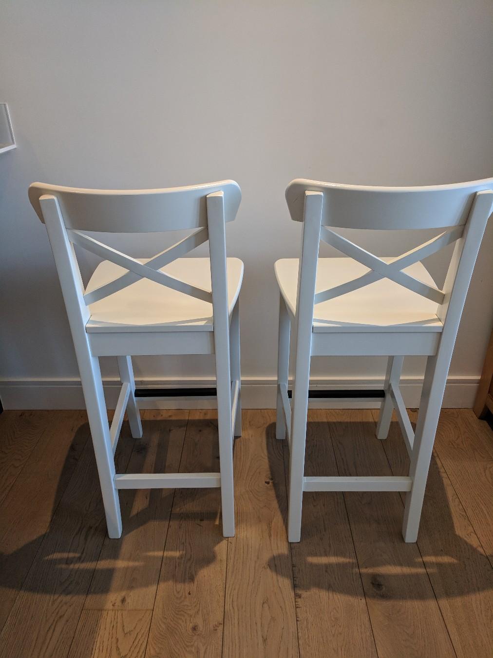 2 White IKEA Ingolf bar stools with backrest in TW8 Hounslow for £30.00