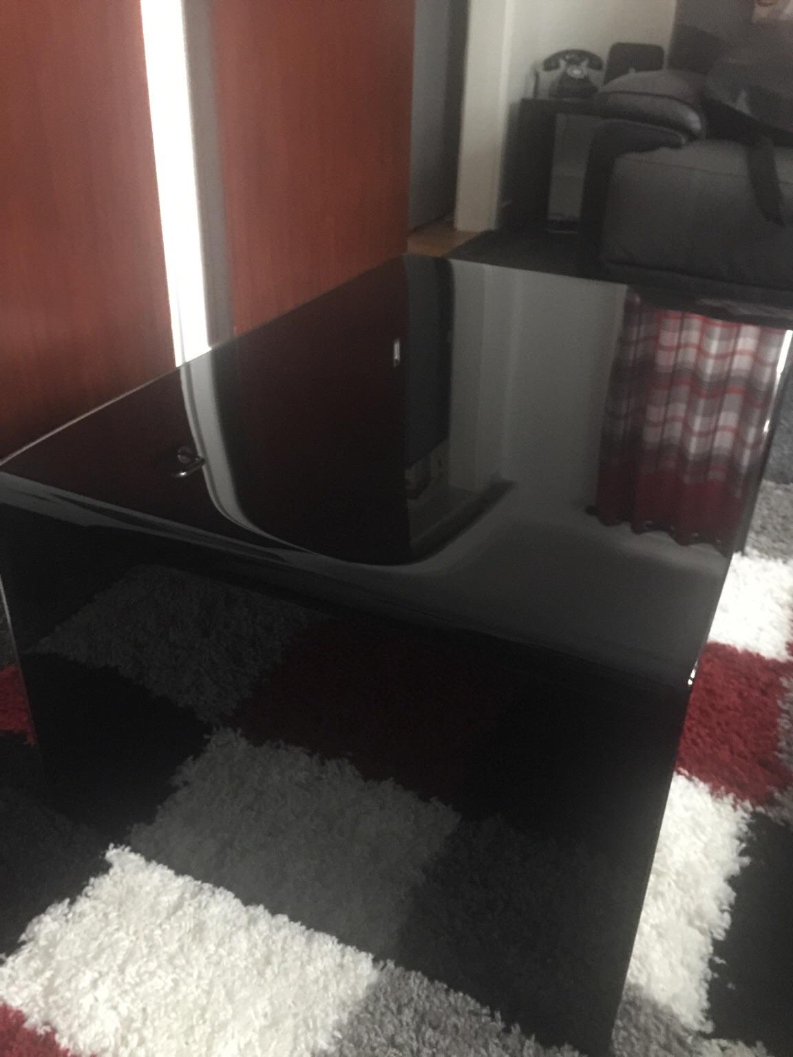 Curved black glass coffee table in S65 Rotherham for £50.00 for sale