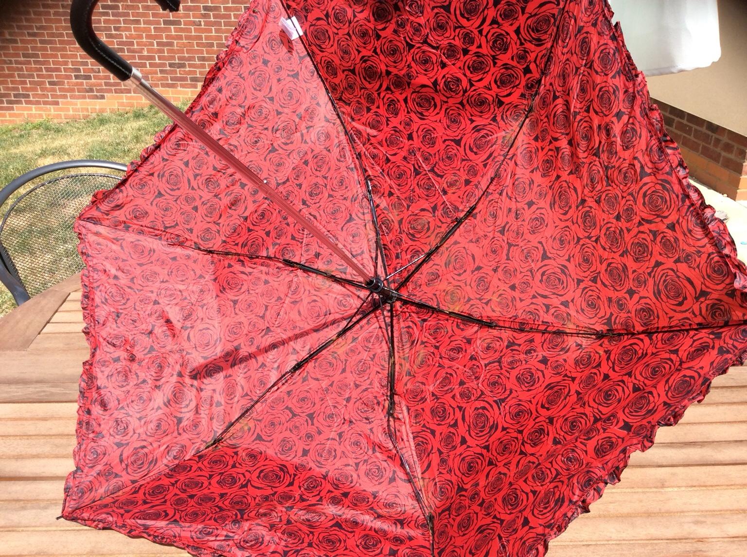 New Look Umbrella. Red & Black Roses in NN14 Kettering for £2.50 for