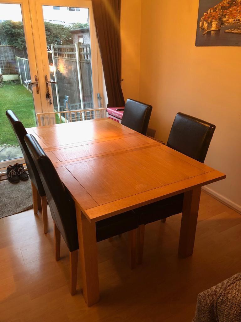 Harvey’s oak extending dining table & chairs in FY3 Marton for £140.00