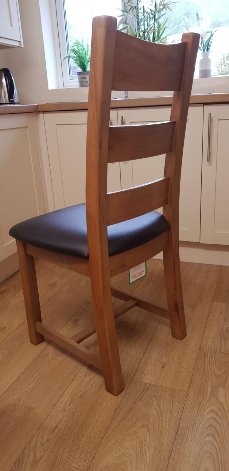 Solid oak dining table with x4 chairs in Aberaman for £250.00 for sale