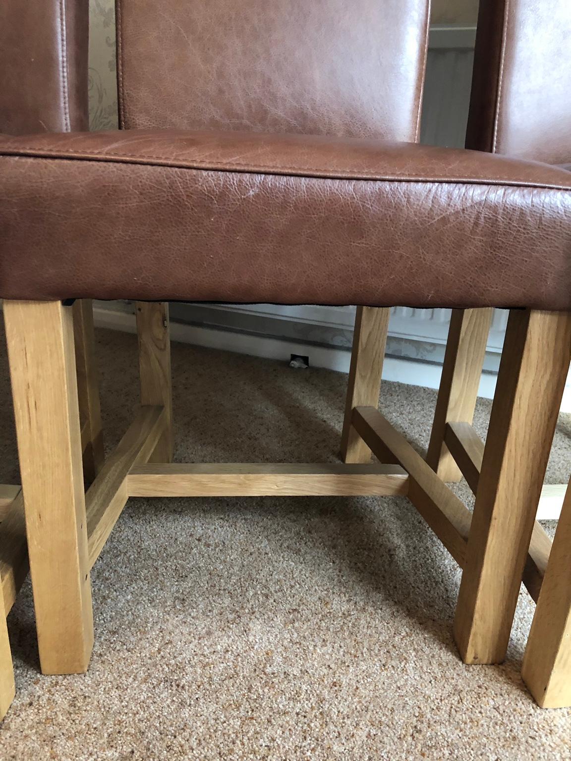 Set of Tan leather dining chairs in Peterborough für £ 80,00 zum