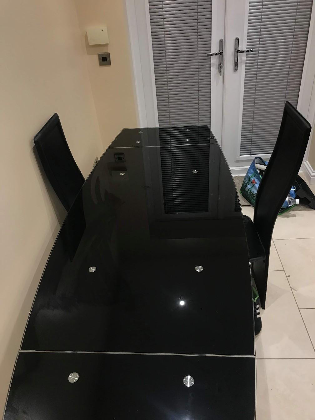 Harveys 6 chair black glass dining table in NE23 Hartford for £150.00 for sale Shpock