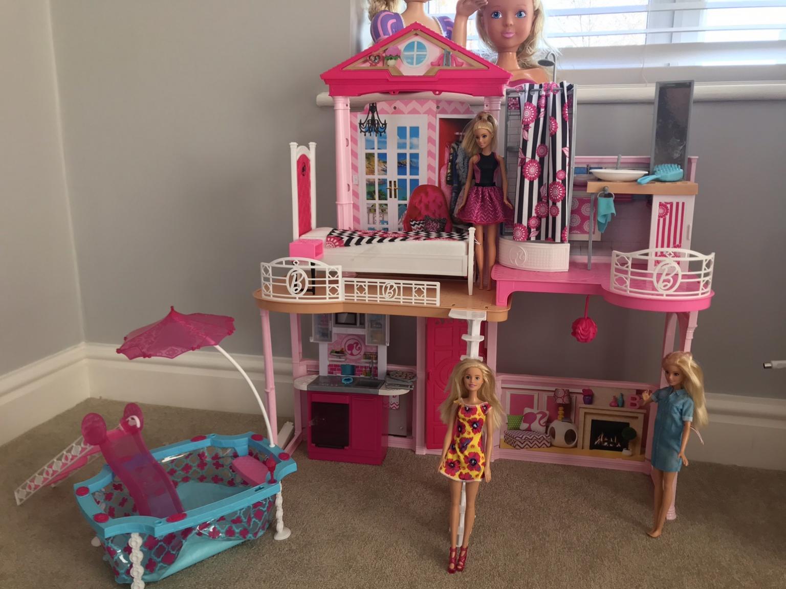 Barbie house complete with 3 dolls in WA4 Moore for £60.00 for sale