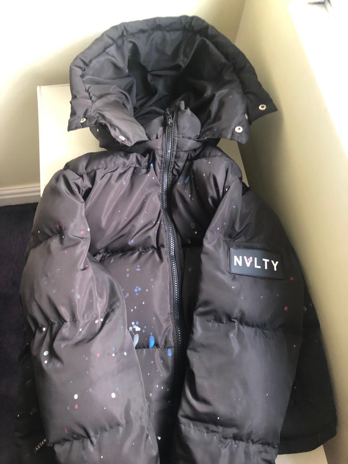 Nvlty black paint splash puffer jacket in B10 Birmingham for £85.00 for