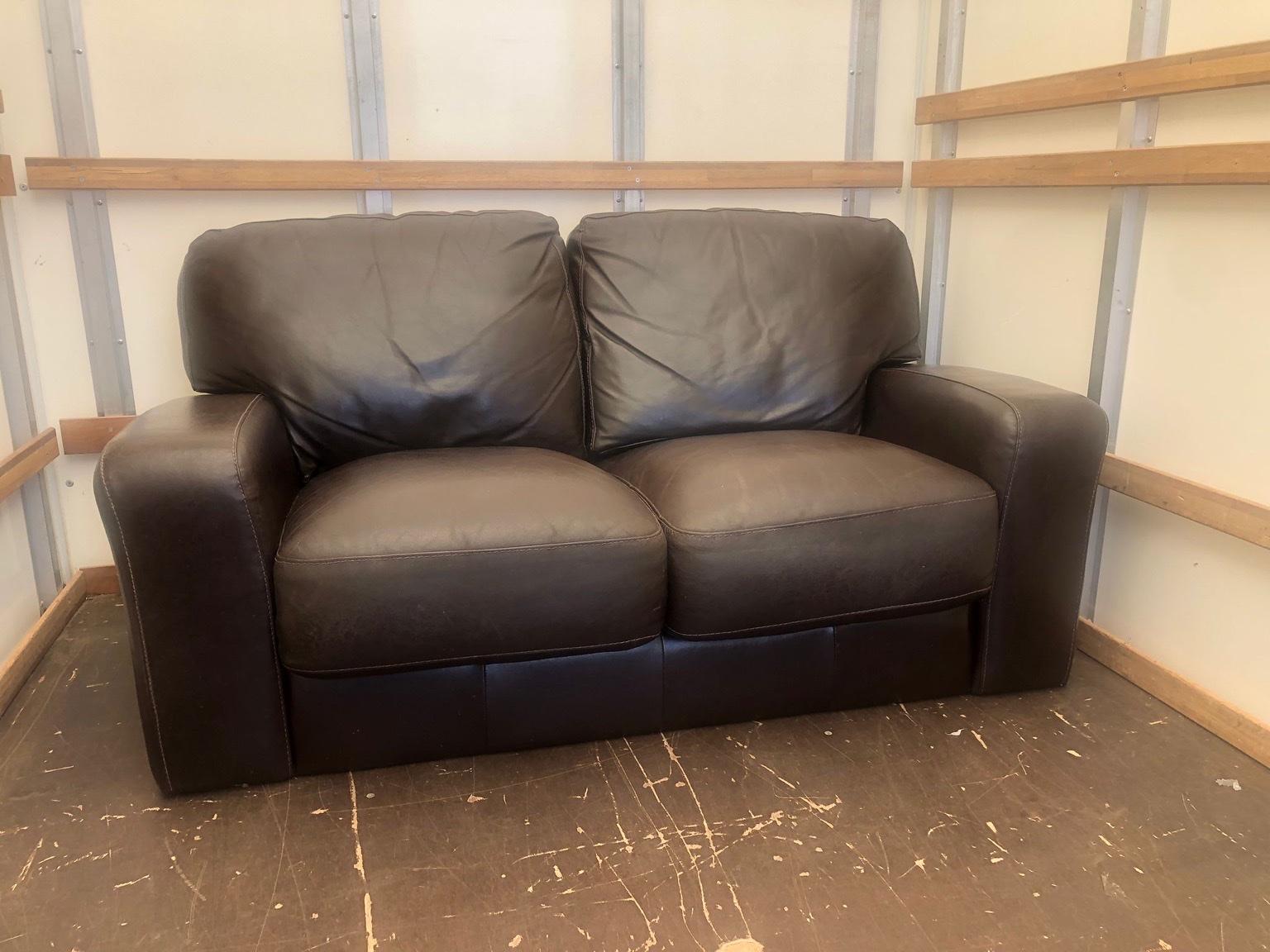 Dark brown chunky leather 2 seater sofa in S62 Parkgate for £80.00 for