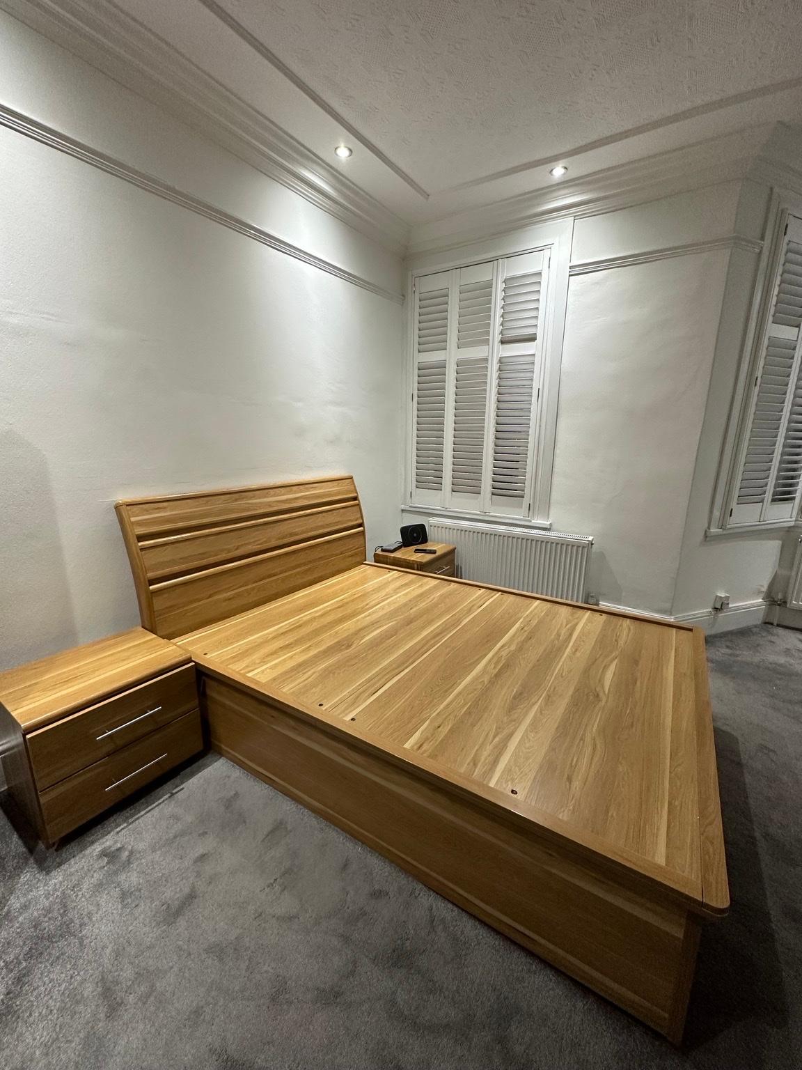 Wooden double storage bed and bedside tables in IG1 London für 150,00