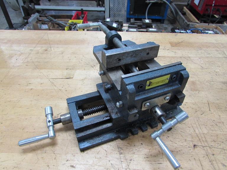 Machines Used Interstate 4.75" XY Vise.