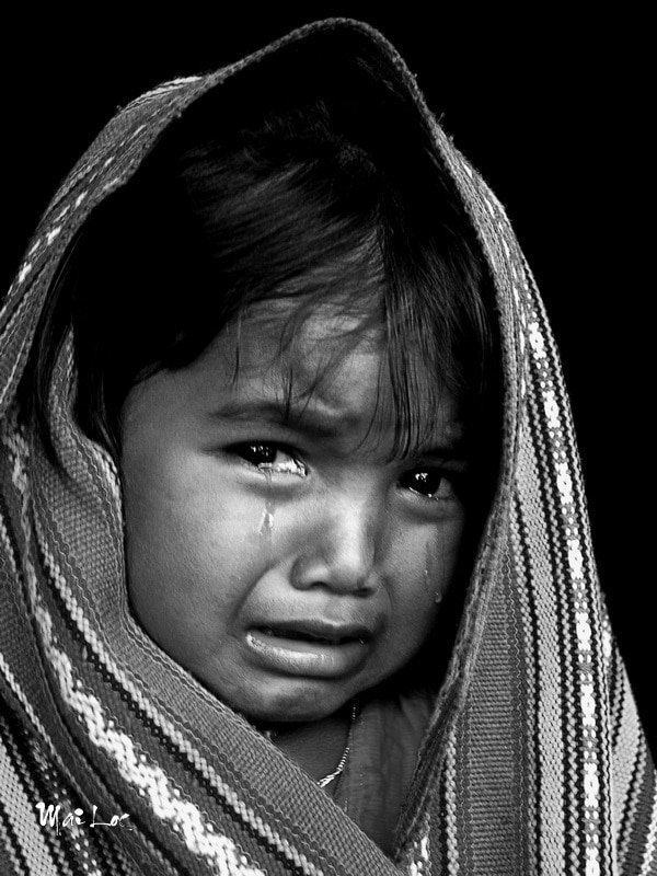 Black and white photos Children Mai Loc’s