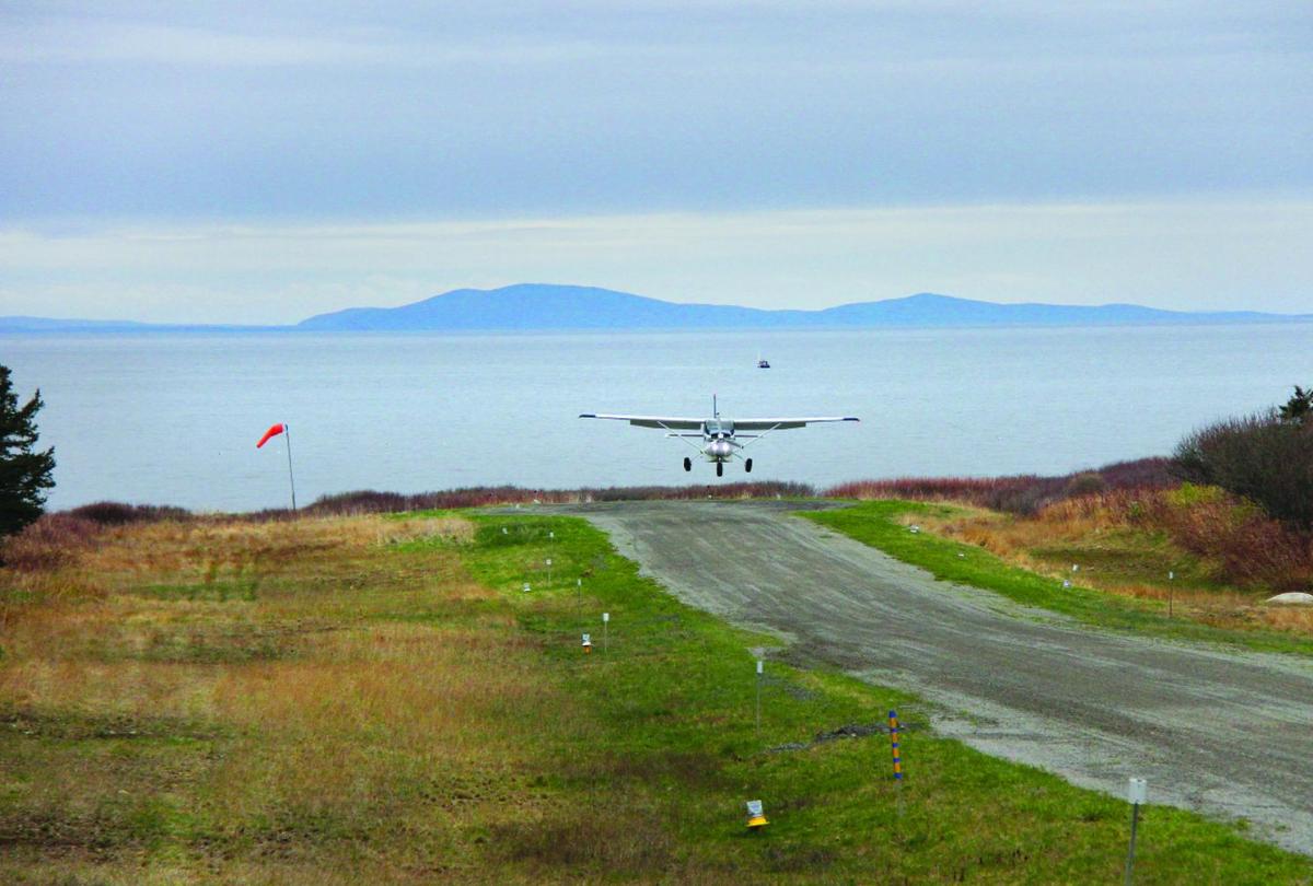 On the Edge of Flight Maine Boats Homes & Harbors