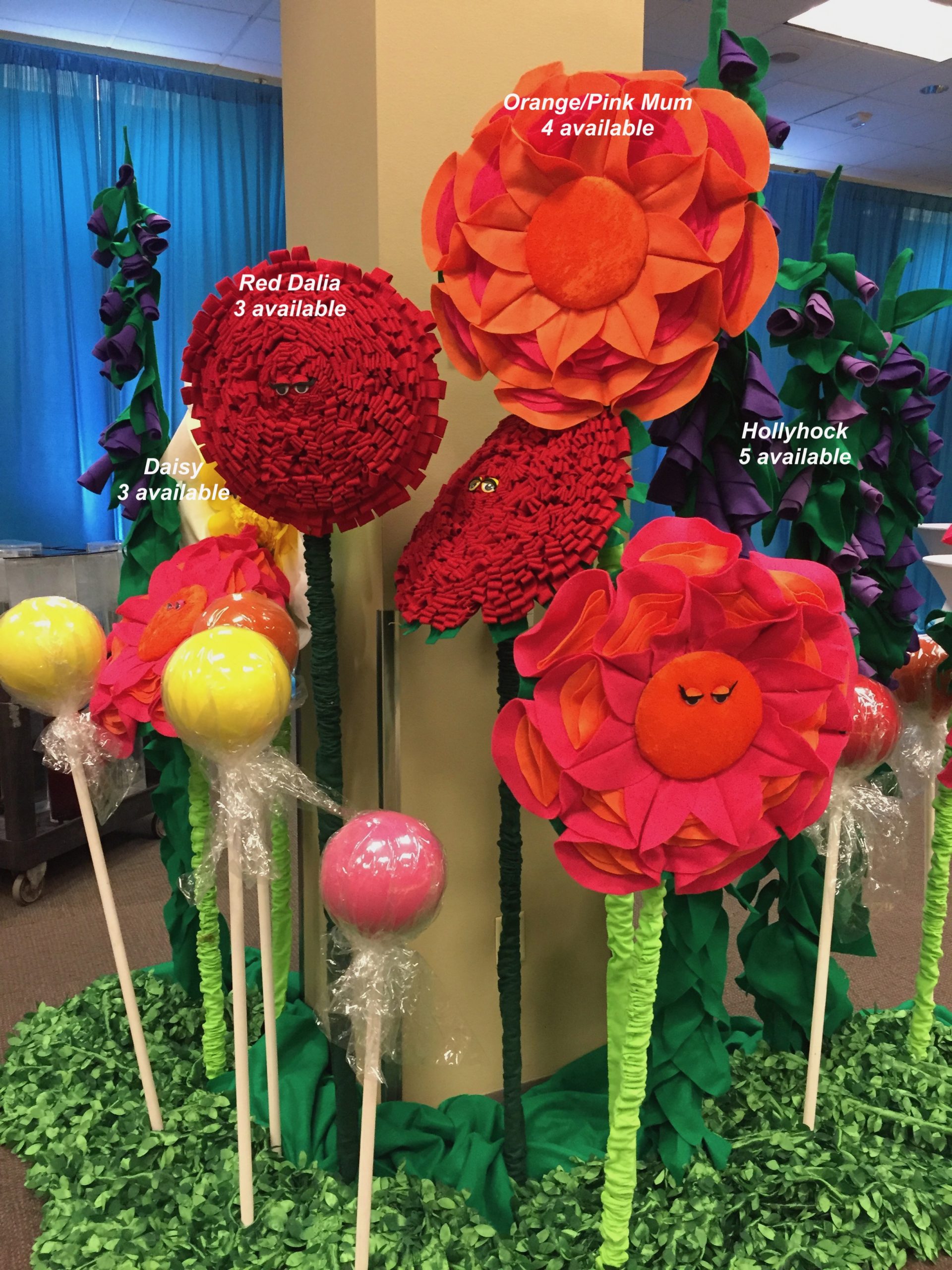 Giant Colorful Flowers with Faces Make a Scene