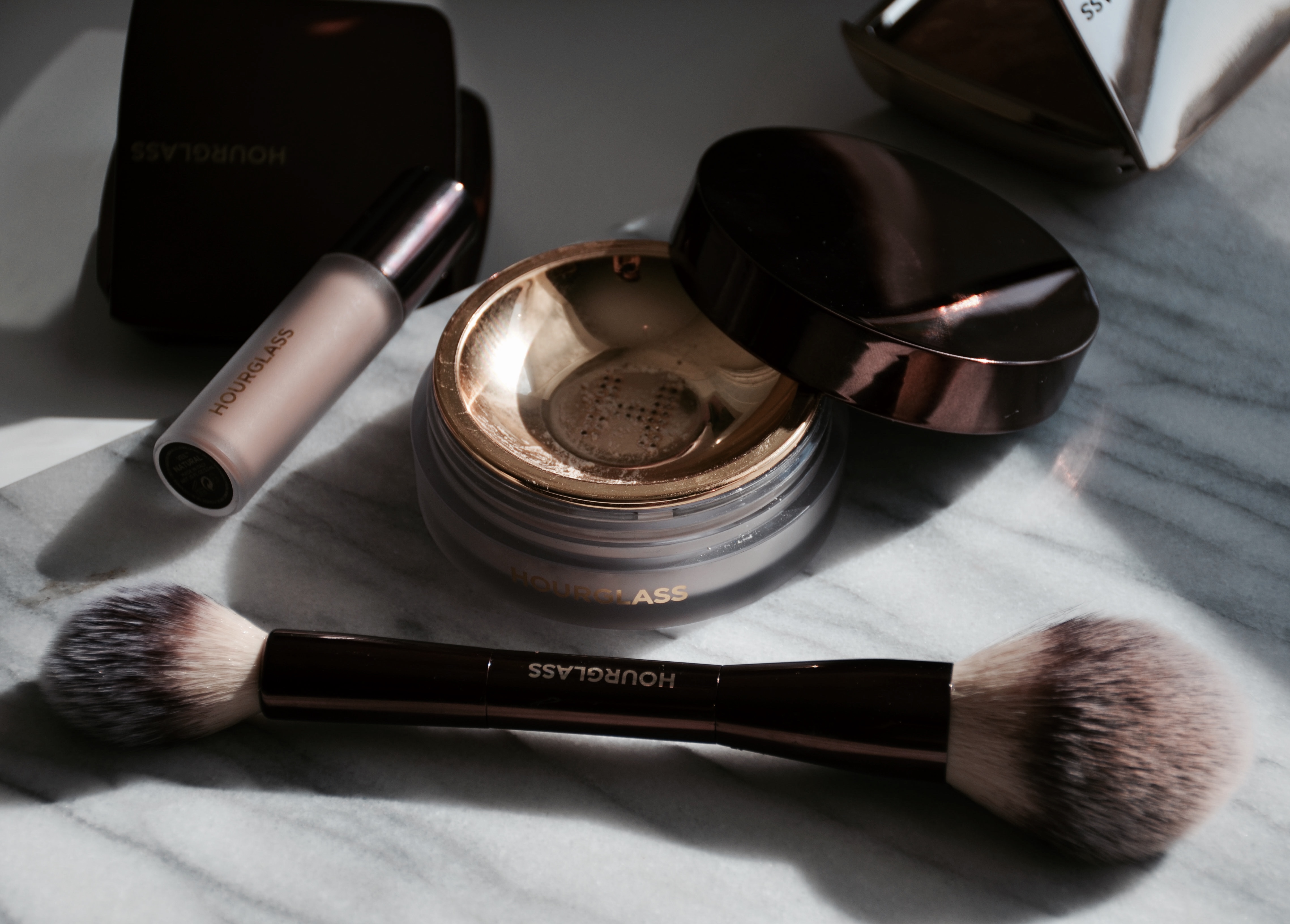 New From HourglassVeil Translucent Setting Powder, Retouching Fluid