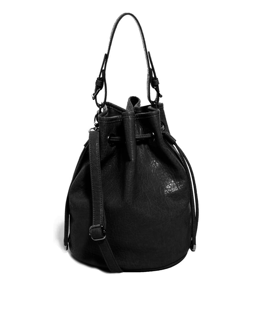SHOP 20 Black leather handbags under 200.