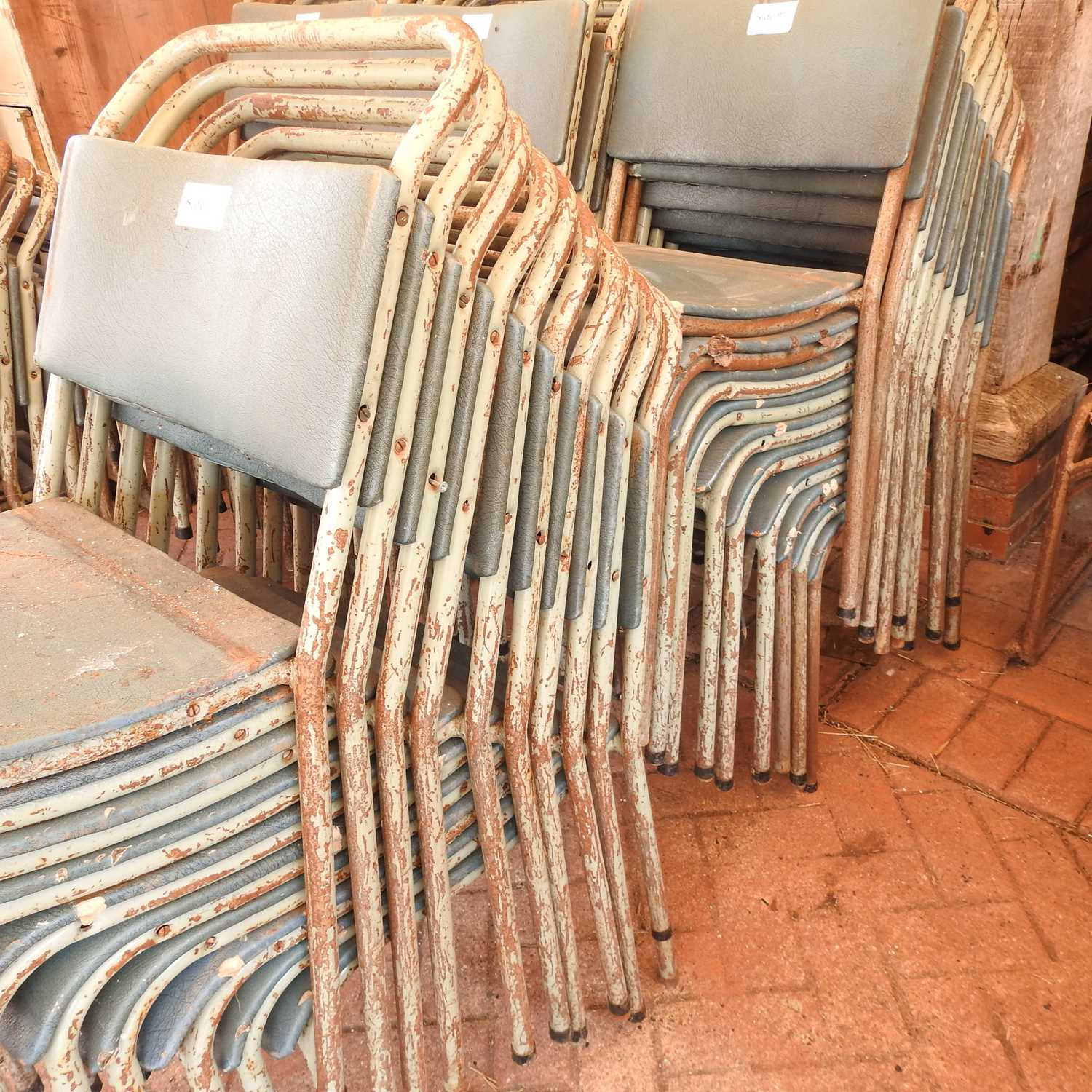 Lot 78 A set of twenty stacking metal chairs