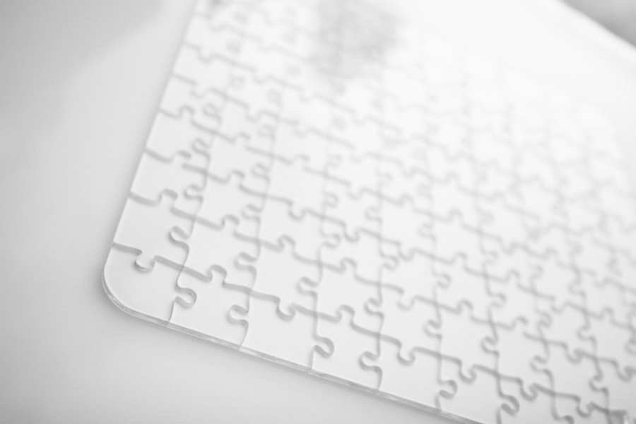 This Clear Glass Jigsaw Puzzle is Near Impossible Man of Many